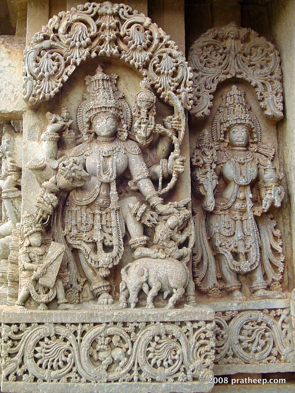 Mahishasura is a buffalo demon in Hindu mythology, known for deception and who pursued his evil ways by shape shifting into different forms. He was ultimately killed by Durga in her Mahishasuramardini form. It is an important symbolism-filled legend in Hindu mythology, particularly Shaktism. Image at Hosaholalu temple.