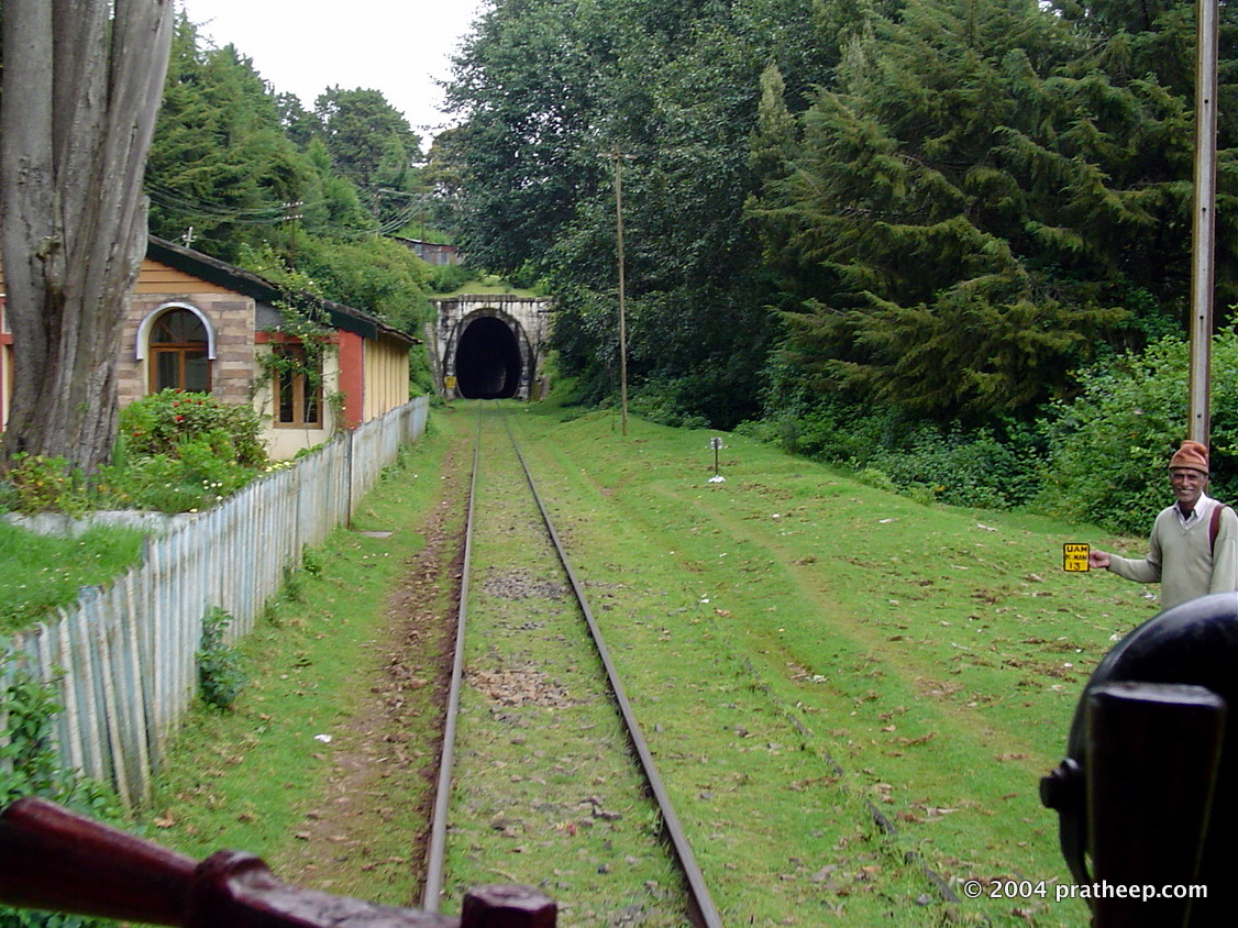 A gangman is person who attends track. He's responsible for maintaining the track stretch near this tunnel. 