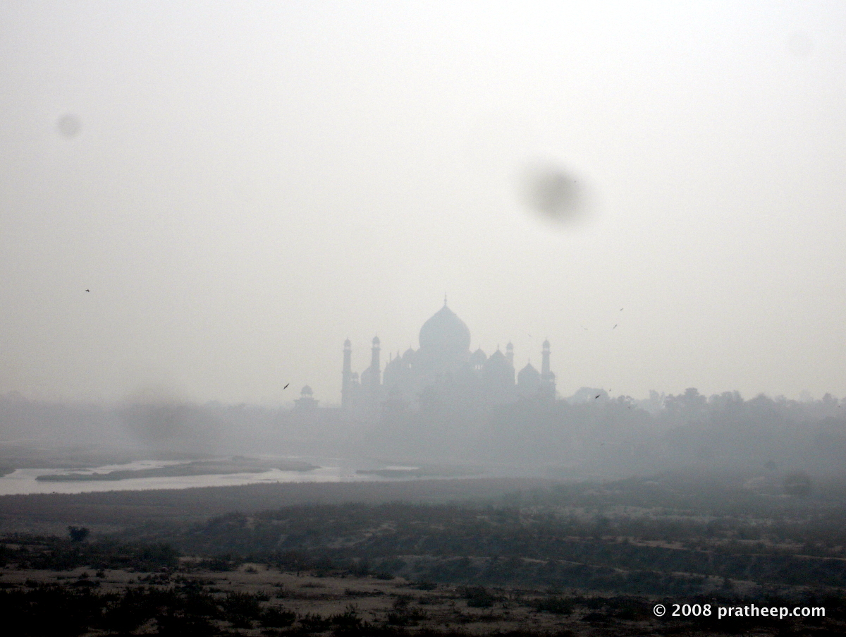 This is one my favorite shots, despite that dust on the lens. I was inside the second floor of jahangiri mahal inside the Agra Fort. Casually came to the window on the Yamuna side. Lo.