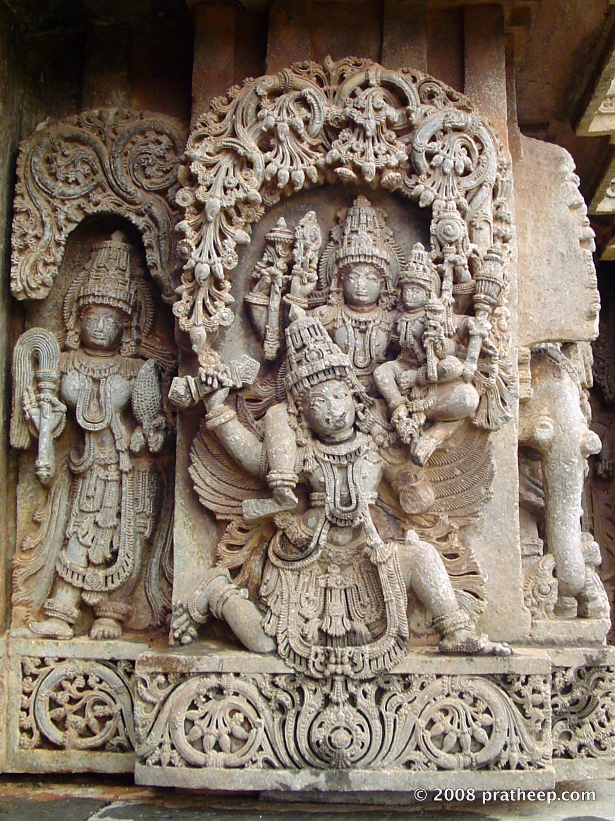 Garuda carrying Vishu and Lakshmi on his shoulder. Garuda ( mythical eagle) is considered Vishnu's vehicle. 